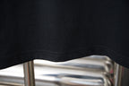 Black Prada T-shirt curved hem close-up