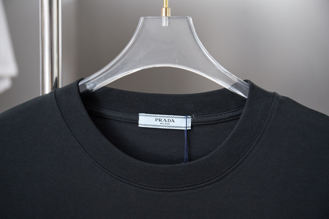 Black Prada crewneck T-shirt close-up with interior neck tag