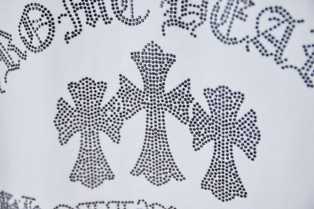 Rhinestone bow motif on white T-shirt graphic detail