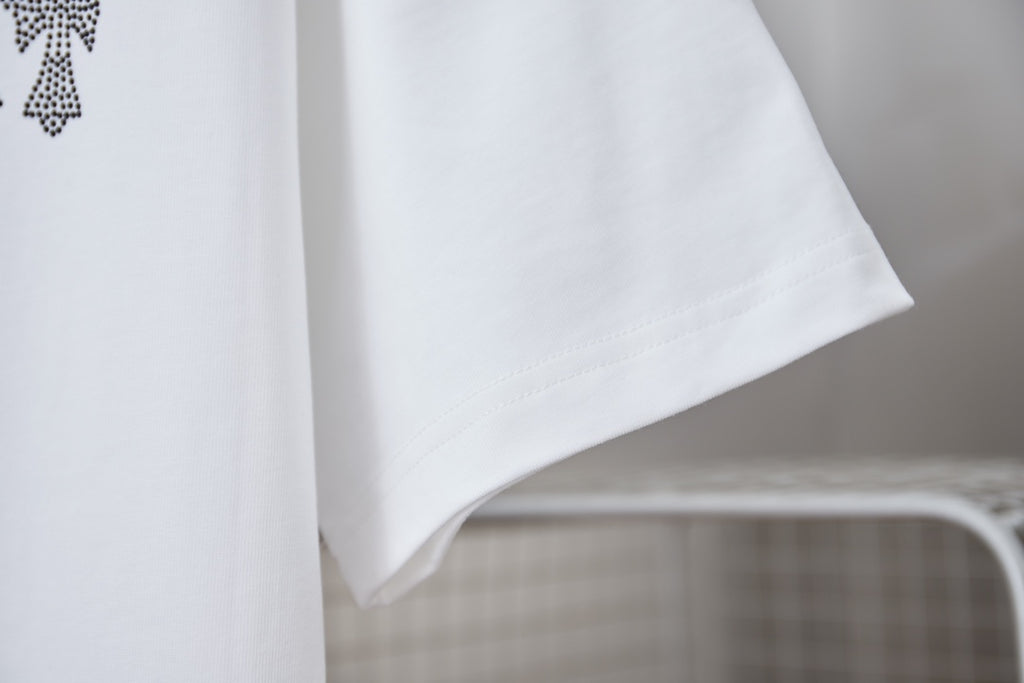 White T-shirt sleeve and curved hem detail