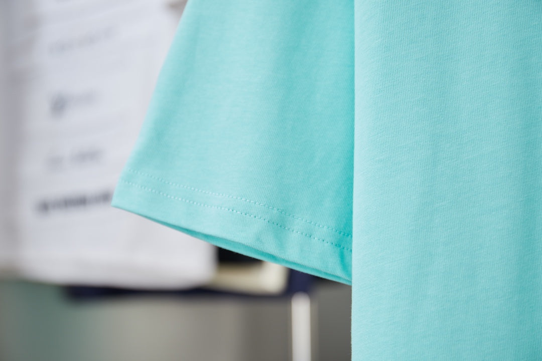 Turquoise short-sleeve T-shirt hem and sleeve edge