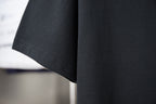 Dark short-sleeve T-shirt with clean curved hem