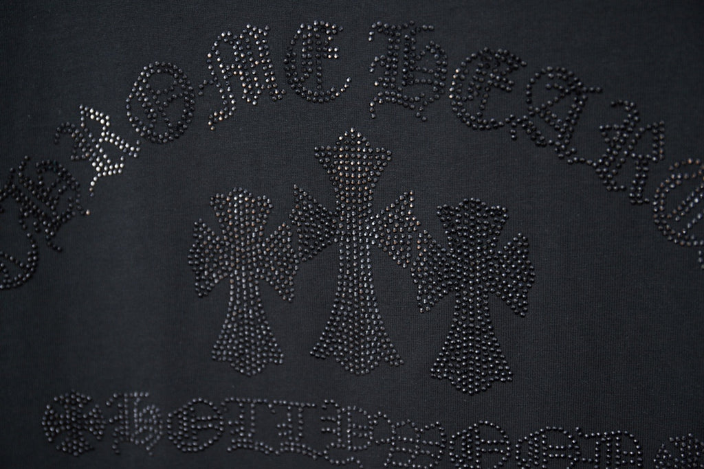 Dark T-shirt featuring an all-over rhinestone logo motif