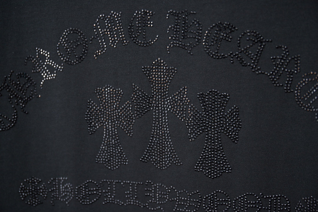 Dark T-shirt featuring an all-over rhinestone logo motif