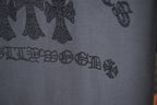 Close-up of rhinestone back graphic text on dark gray short-sleeve T-shirt