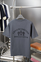 Crew-neck short-sleeve T-shirt back view, with large rhinestone cross-and-text graphic