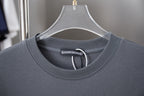 Crew-neck short-sleeve T-shirt collar close-up with inner label