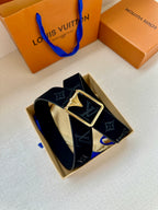 Black monogram belt with gold-tone square buckle and LV-style details