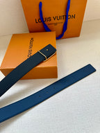 Louis Vuitton belt strap close-up with silver-tone buckle and keeper
