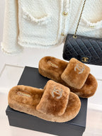 Brown plush slide slippers with Chanel rhinestone CC on front straps