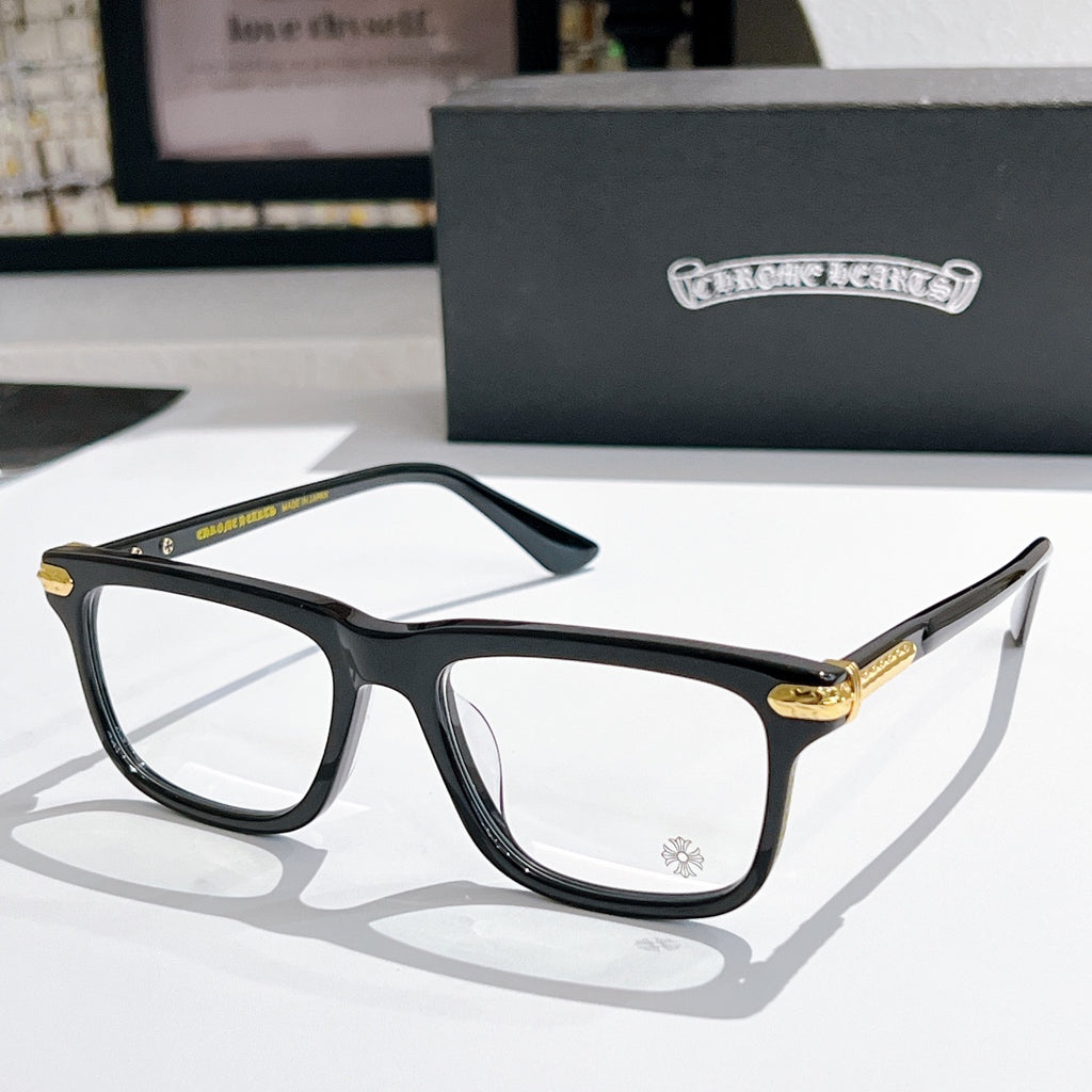 Clear-lens eyeglasses with black frame and gold-accent metal temples