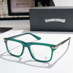 Clear-lens eyeglasses with green frame and silver metal temples