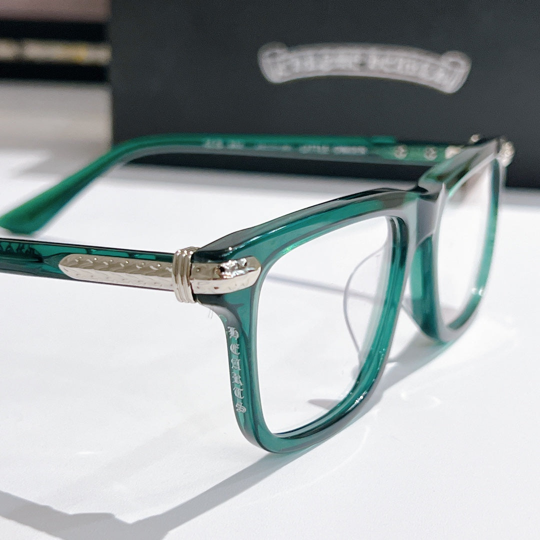 Green clear-lens eyeglasses with silver hinge and metal temples