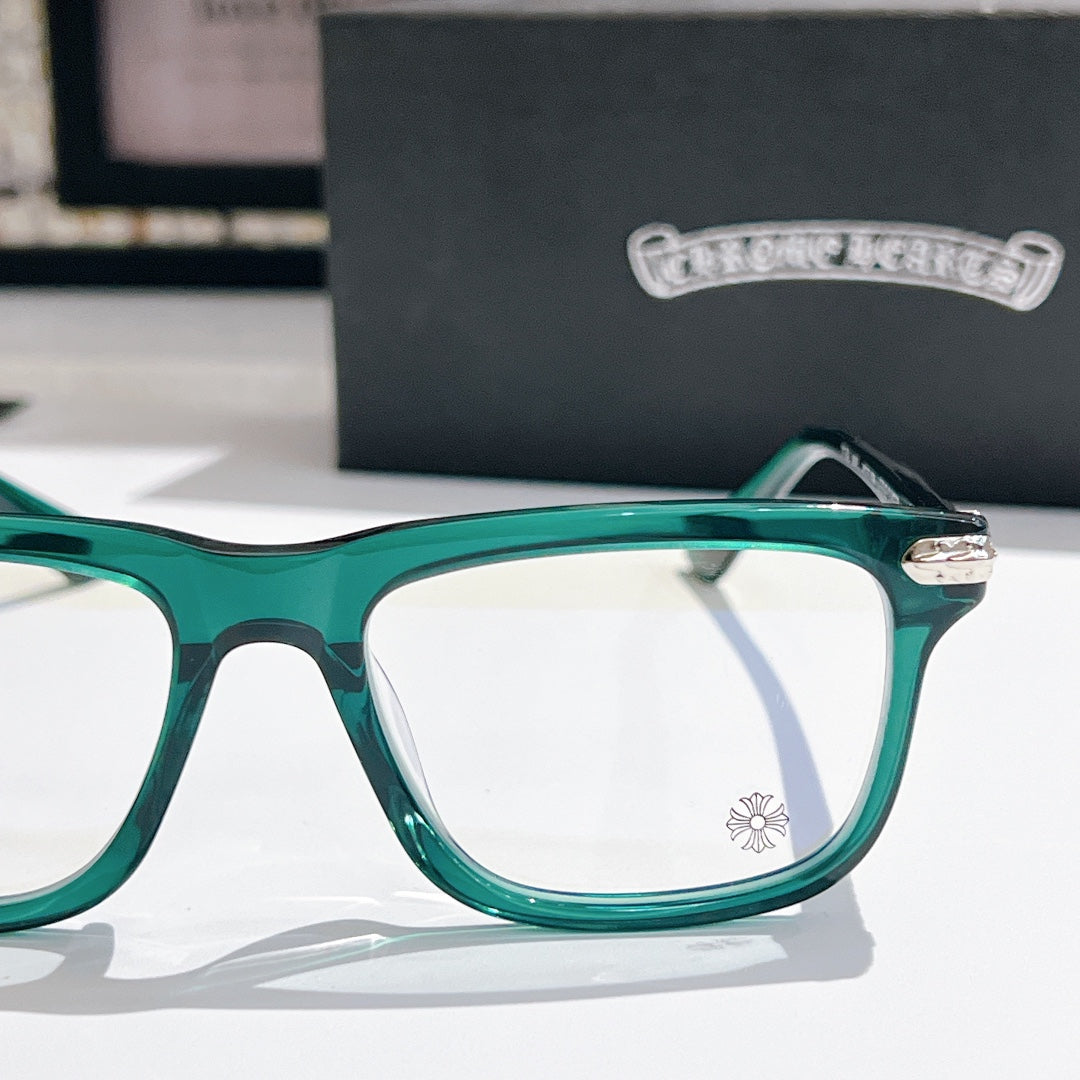 Green clear-lens eyeglasses with thick square frame and metal hinge detail
