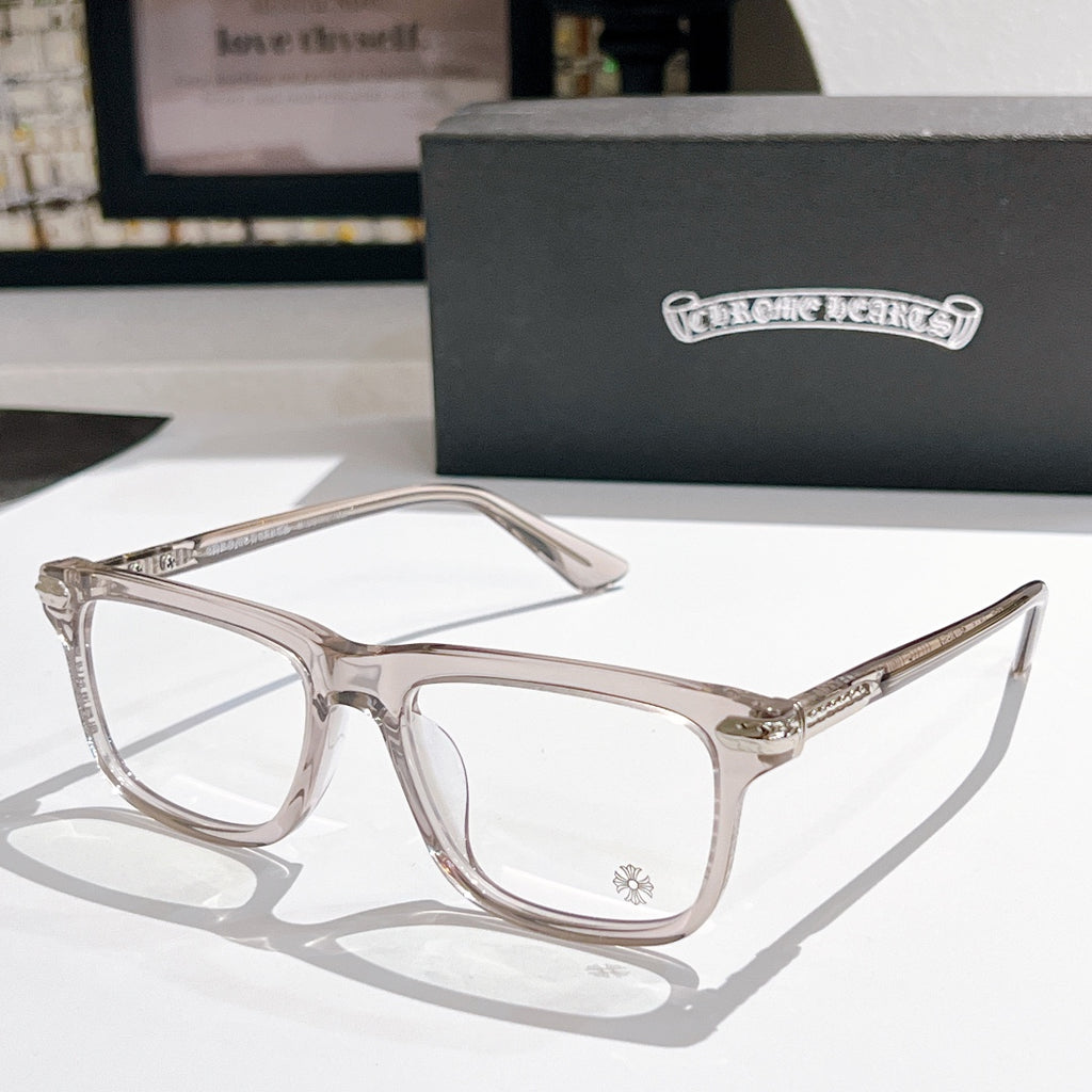 Clear-lens eyeglasses with translucent smoke-gray frame and metal temples