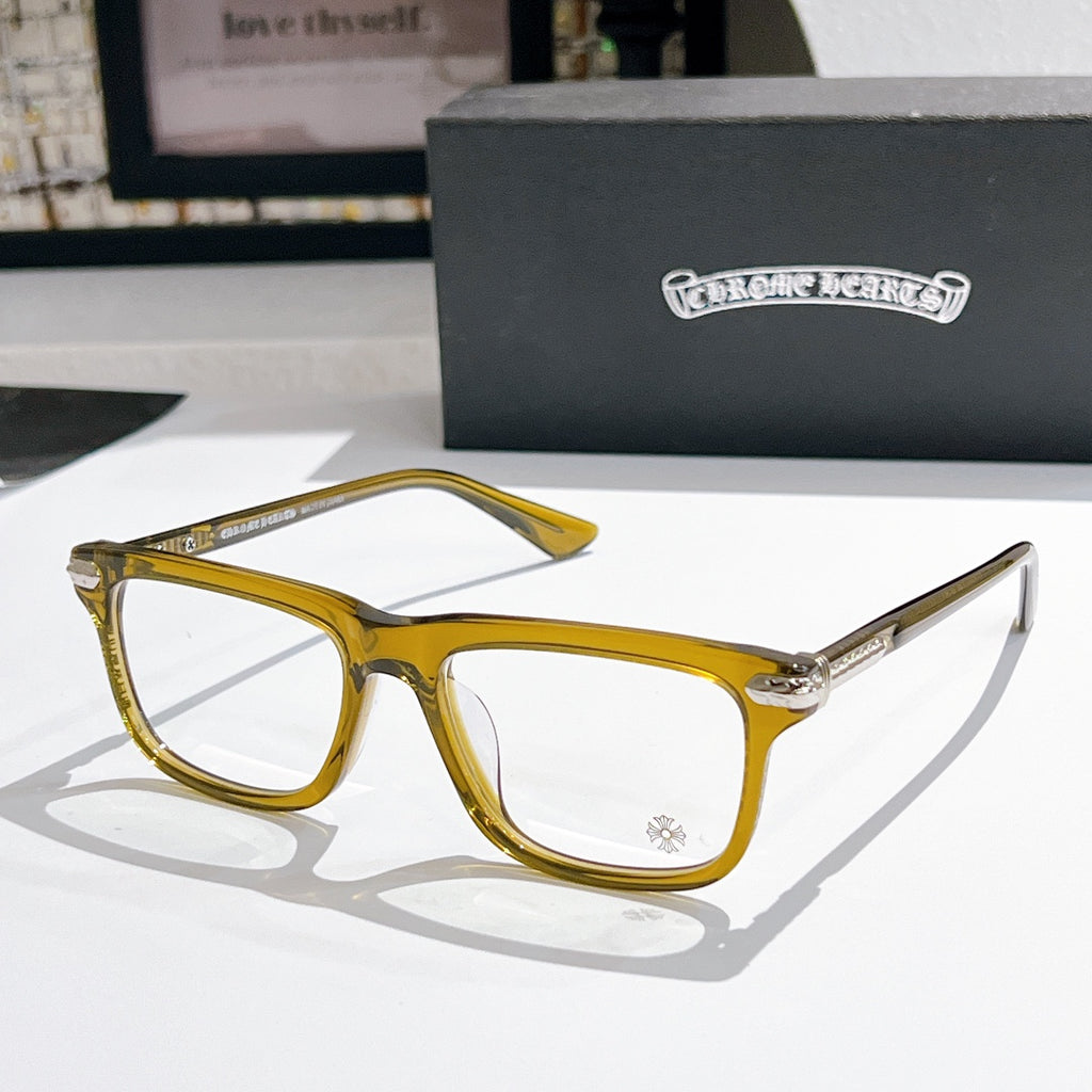 Clear-lens eyeglasses with gold frame and metal arms