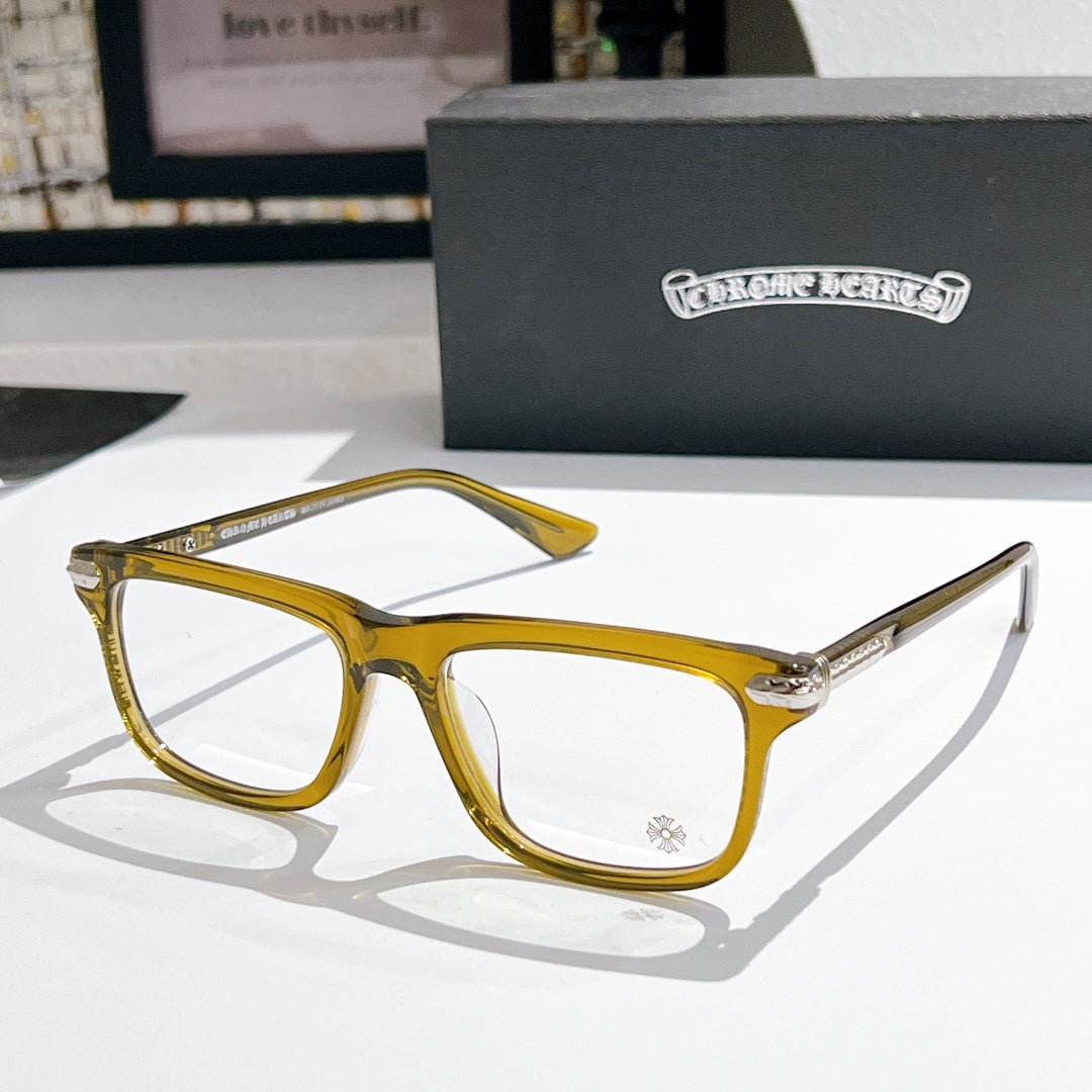 Clear-lens eyeglasses with gold frame and metal arms