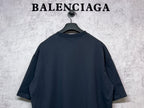 Short-sleeve T-shirt in dark navy with crew neck, visible collar and back view