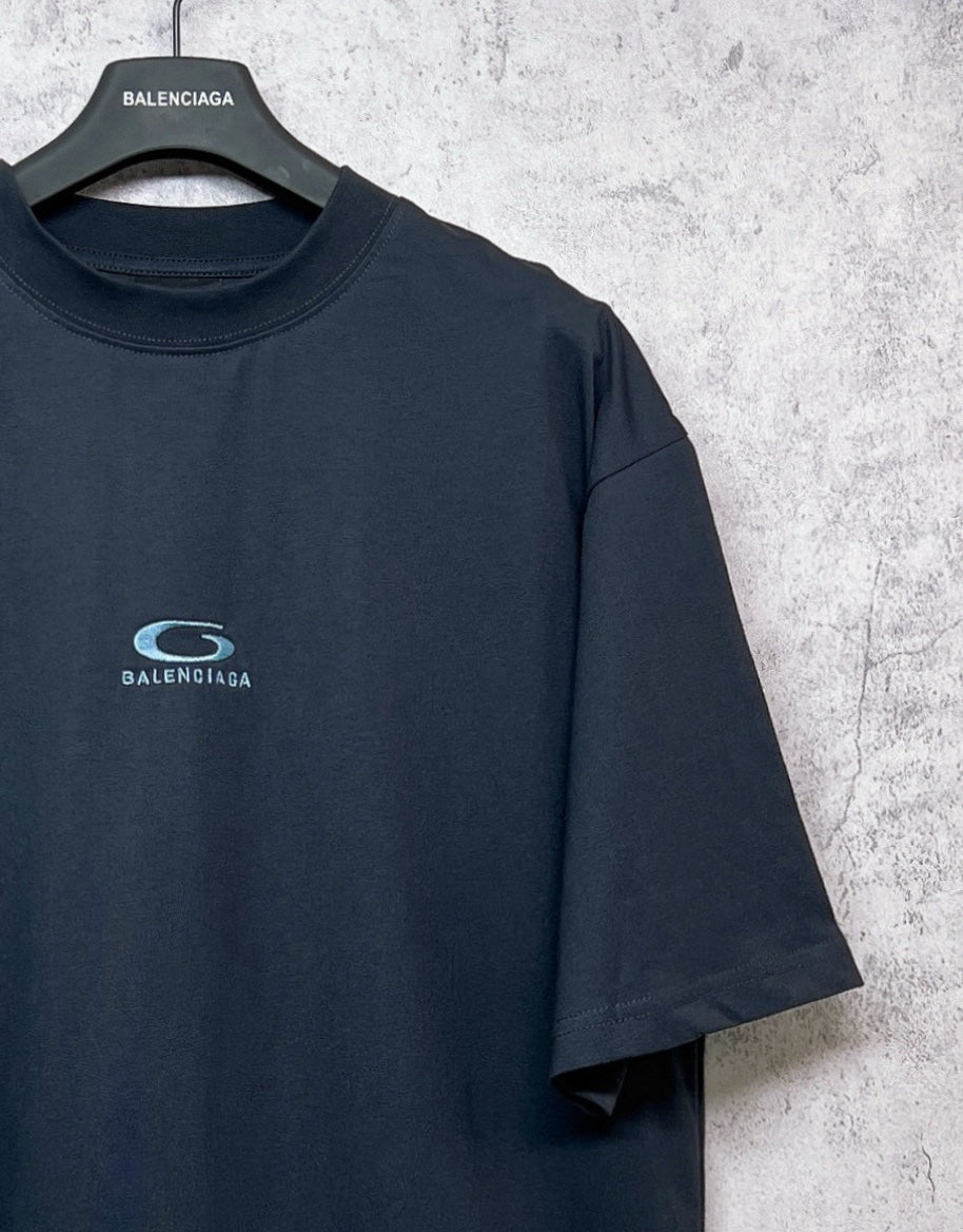 Dark navy short-sleeve T-shirt with crew neck and chest logo emblem