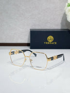 Versace eyeglasses with gold-tone full-rim frame and clear lenses, black temple tips