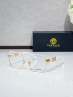 Versace eyeglasses with gold-tone full-rim frame, clear lenses, light-colored temples