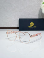 Versace eyeglasses with blush-pink full-rim frame and clear lenses, rose temples