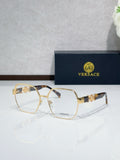 Versace eyeglasses with gold-tone full-rim frame and clear lenses, dark temple tips