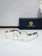 Versace eyeglasses with gold-tone full-rim frame and clear lenses, dark temple tips