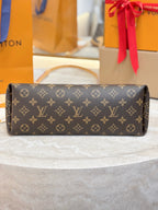 Louis Vuitton monogram handbag top view with side panels and rounded ends
