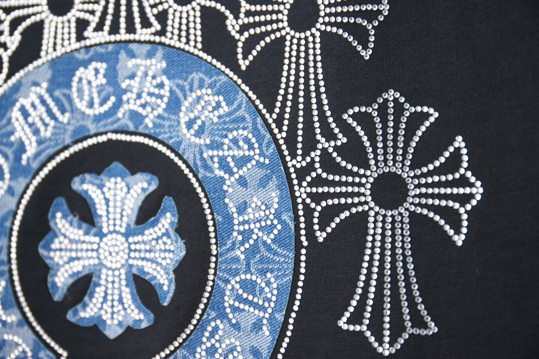 Black T-shirt graphic close-up of blue emblem inside white crystal frame