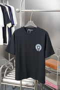Black T-shirt with blue and white rhinestone-style graphic on front