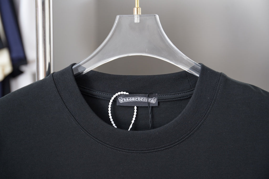 Black T-shirt neckline with inner label and ribbed crew collar