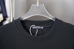 Black T-shirt neckline with inner label and ribbed crew collar