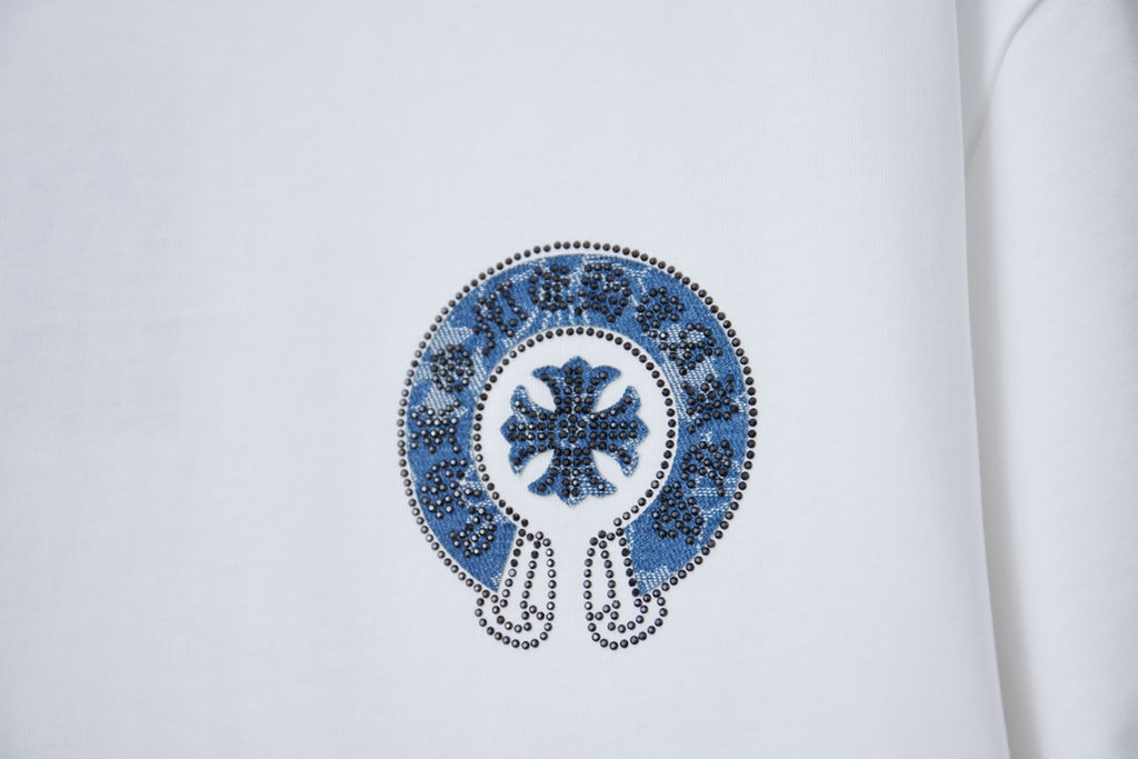 White T-shirt with close-up blue circular emblem print