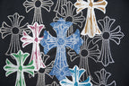 Close-up of multicolor rhinestone floral cross design on black T-shirt
