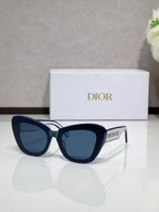 Dior sunglasses with navy frames and dark tinted lenses