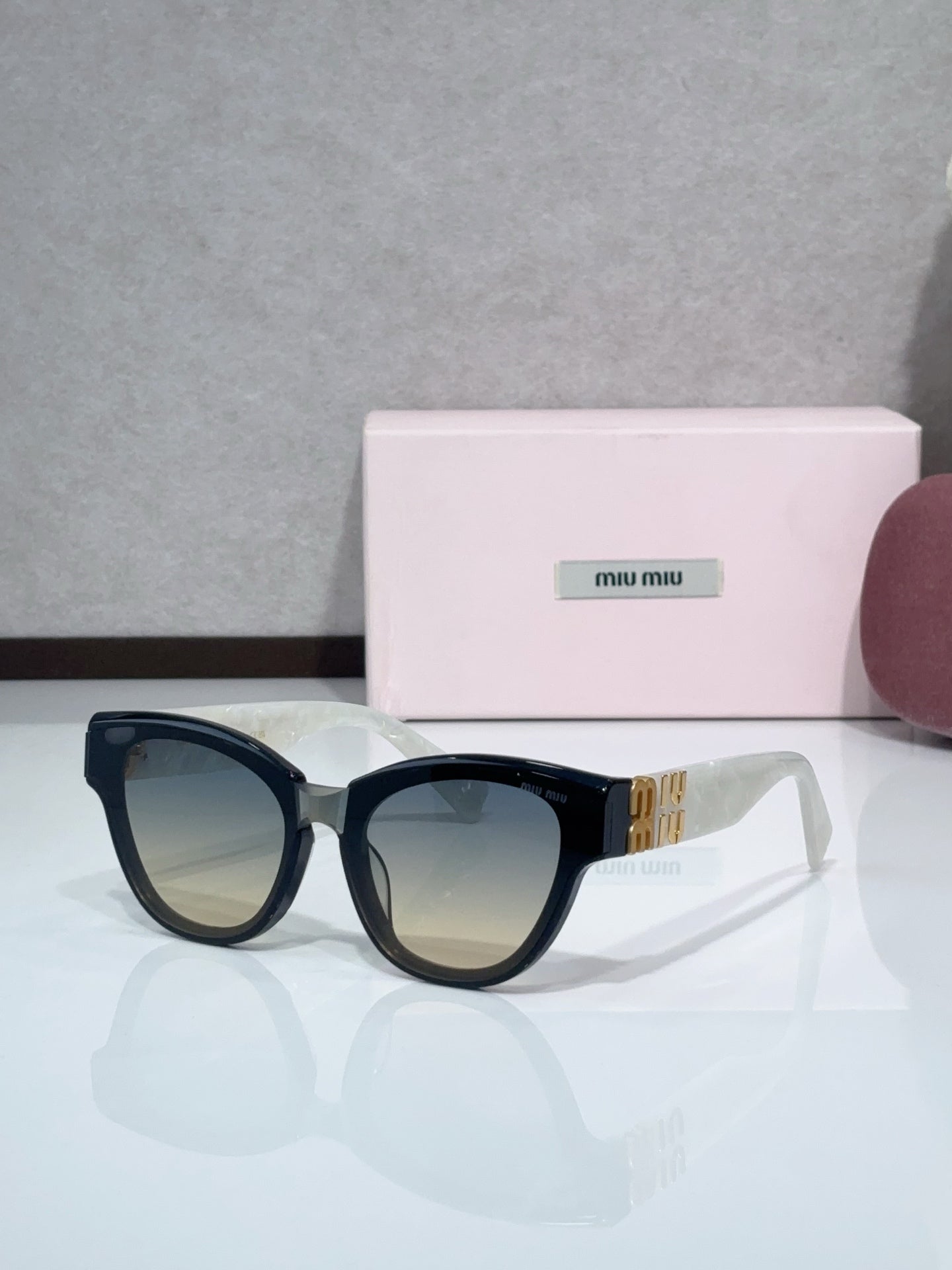 MiuMiu Glasses