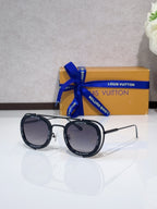 Louis Vuitton round sunglasses with black frame and dark lenses, open temples.