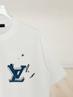White Louis Vuitton T-shirt with blue LV graphic on the chest
