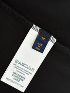 T-shirt care label and size tag on seam with Made in Italy text