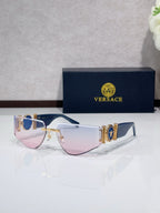 Shield sunglasses with gold-tone metal frame and pale pink mirrored lenses