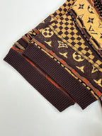 Louis Vuitton monogram shirt cuffs and ribbed hem, brown and gold with red accents
