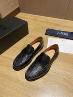 Black leather embossed loafers with strap detail and cushioned insole