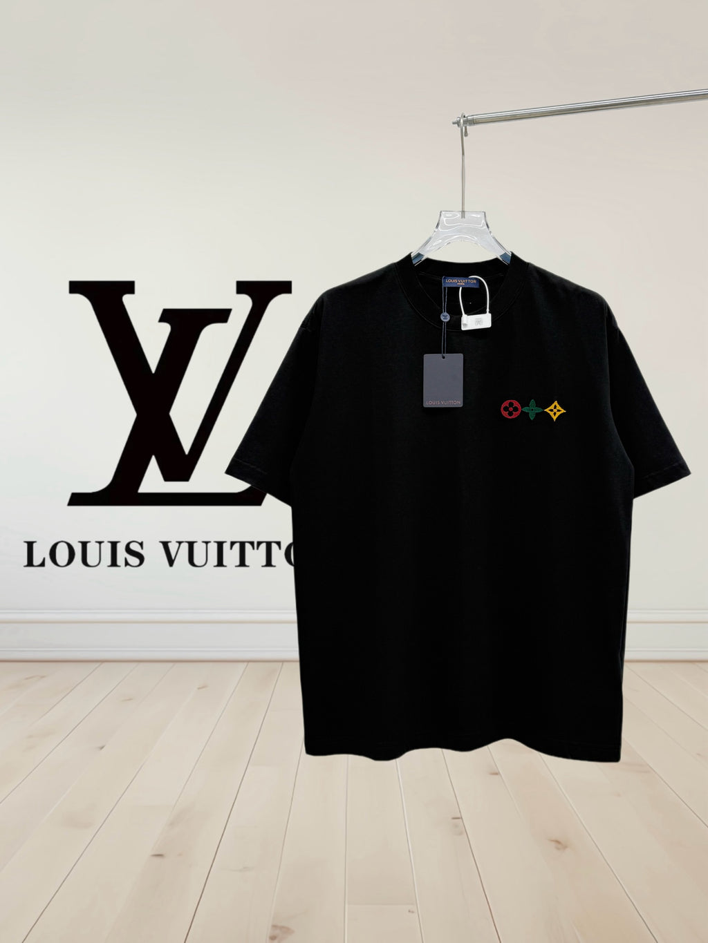 Louis Vuitton black short-sleeve shirt with multicolor logo patches