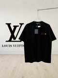 Louis Vuitton black short-sleeve shirt with multicolor logo patches