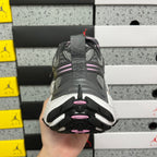 Unisex sneakers heel view with dark gray tread and white midsole edge