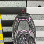 Unisex sneakers heel and tongue view with gray mesh and pink trim details