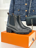 Louis Vuitton black leather chelsea boots, elastic side panels, pull tabs, chunky sole