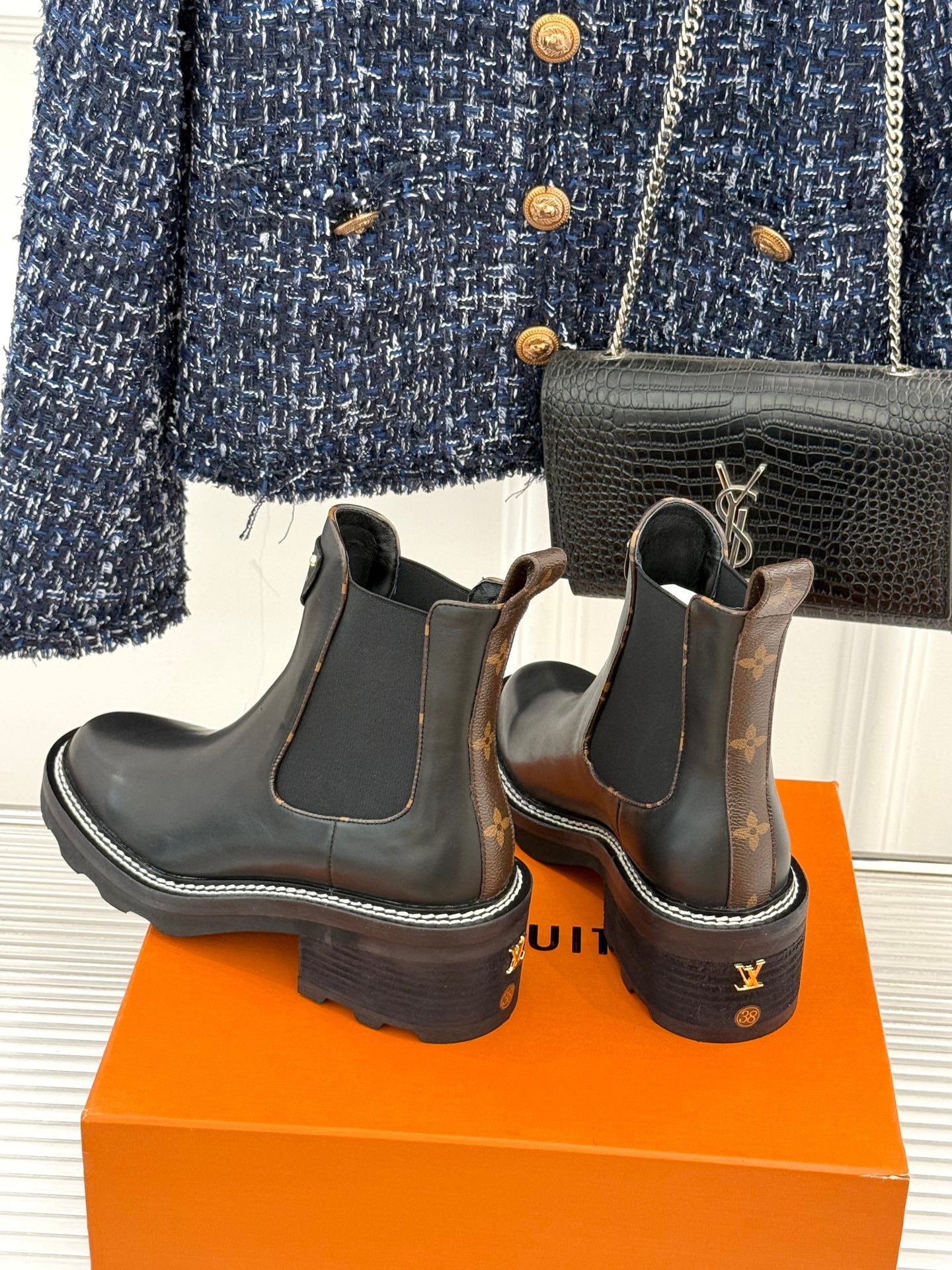 Louis Vuitton black chelsea boots with elastic sides and LV logo heel patch
