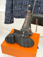 Louis Vuitton black chelsea boots with elastic sides and LV monogram heel patch